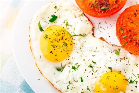 Breakfast With Fried Eggs And Tomato Stock Image Image Of Food Orange 34634445