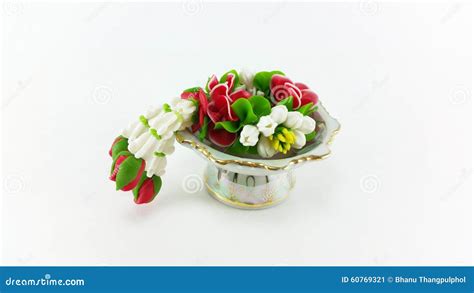 Artificial Temple Flower Garland on Tray with Pedestal Stock Image ...