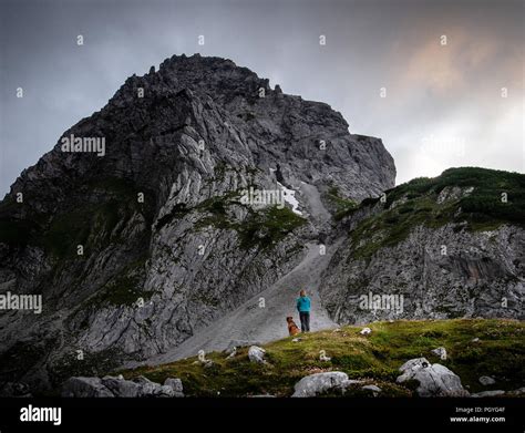 Hiking through the Alps Stock Photo - Alamy