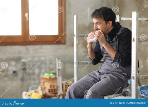 Construction Worker Eating Sandwich At Breakfast Stock Image Image Of