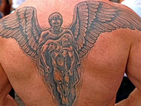 Aggregate More Than 51 Angel Wings Chest Tattoo Meaning Incdgdbentre