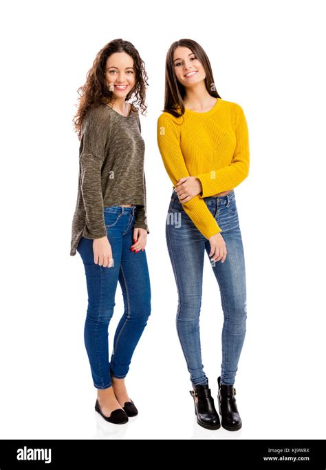 Studio Portrait Of Two Beautiful Girls Smiling Stock Photo Alamy