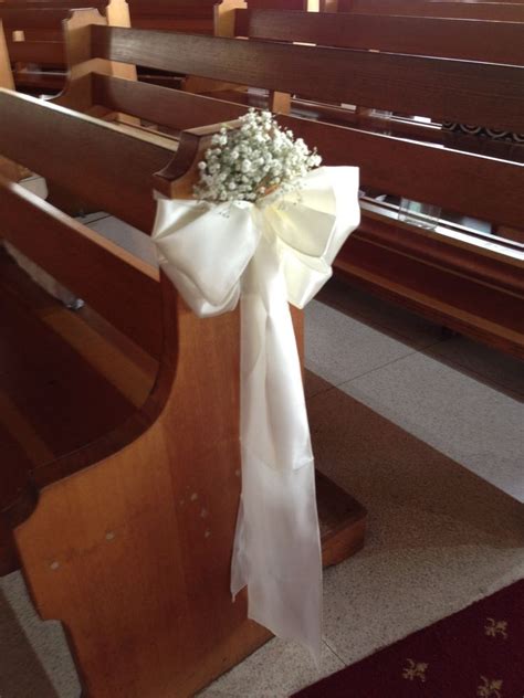 Satinb Pew Bow With Sprig Of Babies Breath White Wedding Flowers