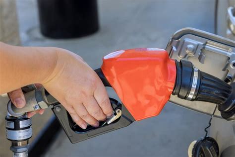 Premium Photo Cropped Hands Of Man Repairing Car