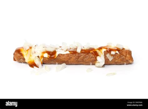 Frikandel speciaal, a Dutch fast food snack, with mayonnaise, curry sauce and chopped onions ...