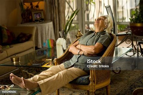 Old Woman Sleeping On Chair At Home Stock Photo Download Image Now