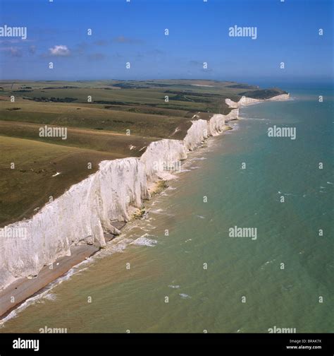 Aerial image of the chalk cliffs of the Seven Sisters, with Belle Tout ...