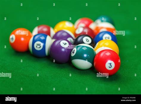 Billiard Balls In A Green Pool Table Stock Photo Alamy