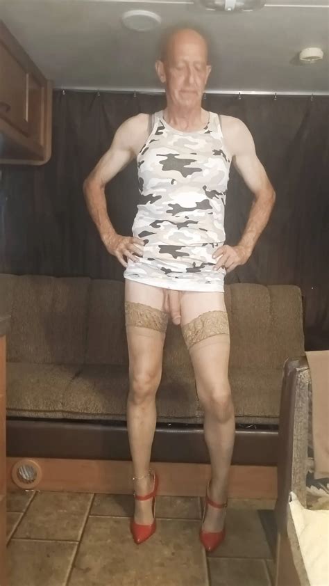 Faggot Andrew Brown In Camo Dress Thigh Highs And Heels Nude Pics