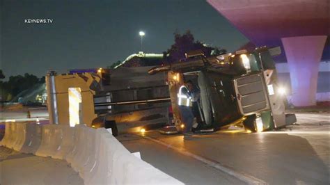 Ontario Ca Dump Truck Overturns When Raised Bed Slams Into Overpass