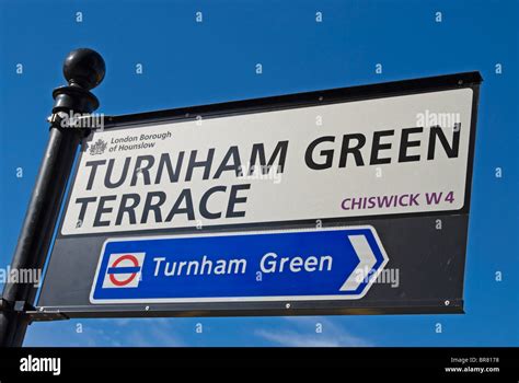 street sign for turnham green terrace and turnham green tube station in ...