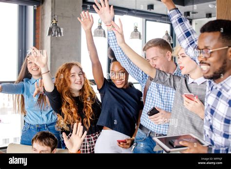 Smiling Youth Is Raising Hand To Show That They Are Ready To Help Old