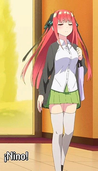 A Girl With Pink Hair Is Walking Down The Floor In Front Of An Open Door