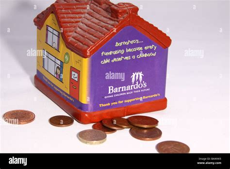 Barnardos Charity Collection Box In The Shape Of A House Used For