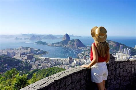 Premium Photo Tourism In Rio De Janeiro Back View Of Traveler Girl Enjoying Sight Of Famous