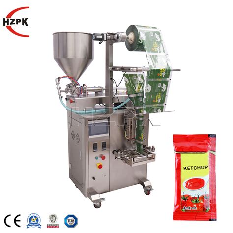 Hzpk Automatic Liquid Paste Oil Food Polythene Bag Heat Seal Packaging