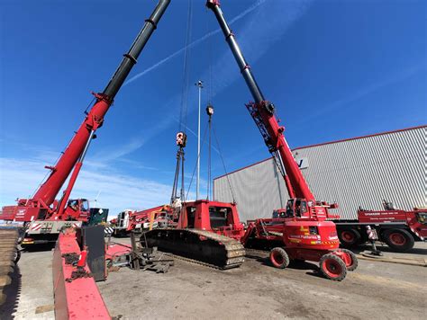 Dismantling And Loading Onto Transport Two Mantsinen Harbour Cranes At