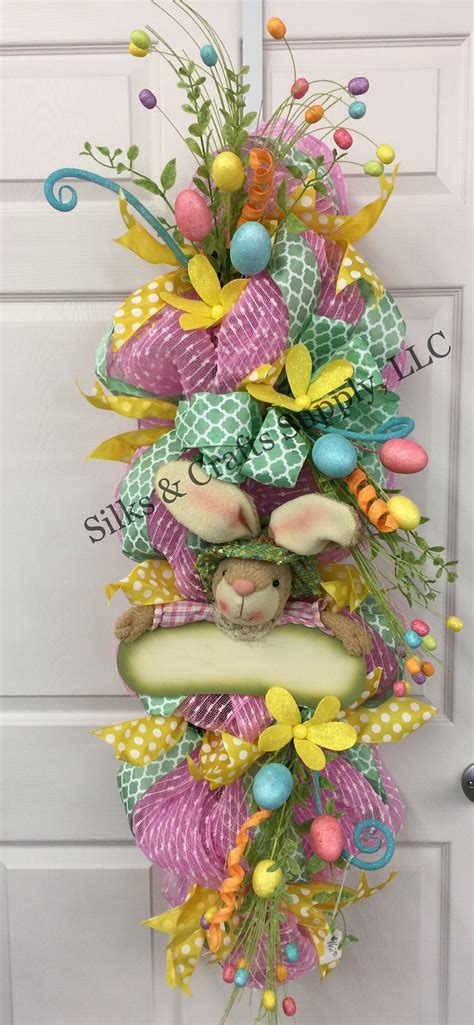 Deco Mesh Swag With Bunny Sign And Pastel Ribbons And Flowers Easter