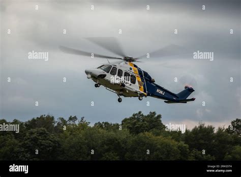 The New Jersey State Police Helicopter Landing At An Airport In