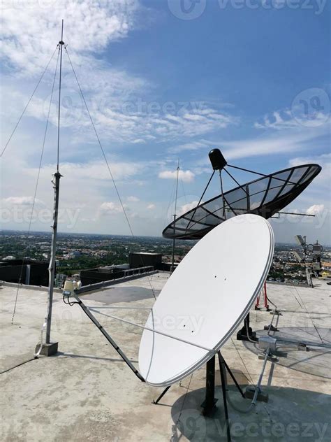 A Satellite Dish Is Installed On The Roof Of A Machine Room On The Top