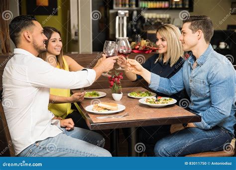 Two Couples Eating Out Together Stock Photo Image Of Boyfriend