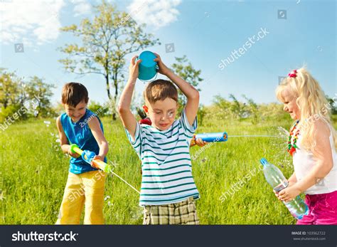 Soaked Happy Kids Playing Water Meadow Stock Photo 103962722 Shutterstock