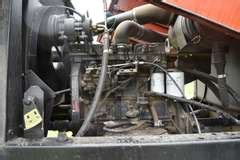 2000 Hesston 8250 Swather - Musser Bros Inc