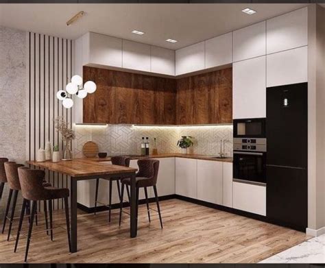 A Modern Kitchen With Wooden Flooring And White Cabinetry Along With