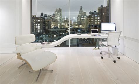 modern office with Douglas Dinesen wood floor - Decoist