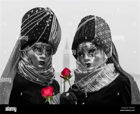 Two Women Dressed Up For The Carnival In Venice Veneto Italy Stock