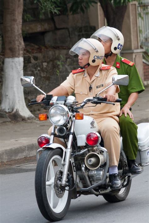 Two Csgt Police Officers On A Motorbike In Hoi An Vietnam Editorial