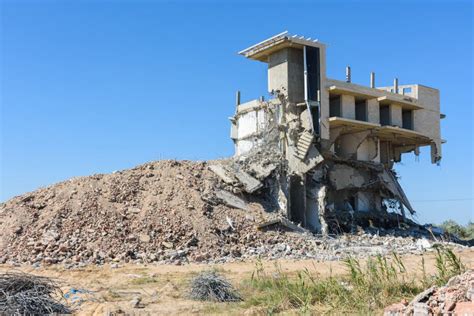 destroyed illegally constructed building   hotel complex stock