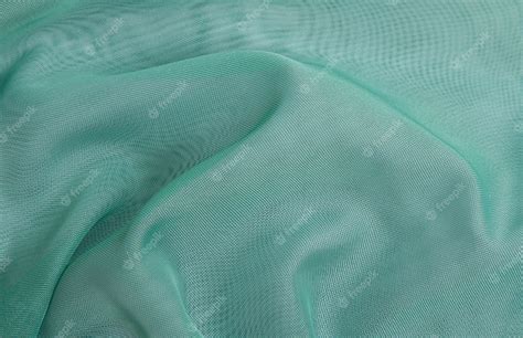 Premium Photo | Emerald color crumpled fabric background,light airy, transparent fabric texture.