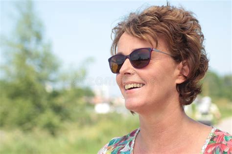 Beautiful Happy Mature Caucasian Woman Outside In The Park Stock Photo Image Of Healthy