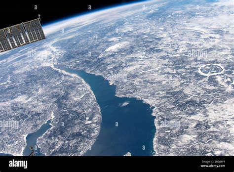 View From Space Of Manicouagan Crater Right Center And The St