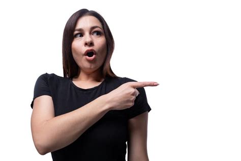 Premium Photo Year Old Brunette Woman With Brown Eyes Points Her Finger To The Side