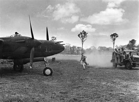 Scramble On An Airfield At Port Moresby New Guinea 1943 As Pilots Race