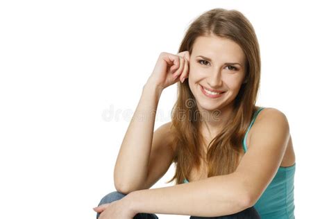 Retrato De Una Sentada De La Mujer Bastante Joven Foto De Archivo