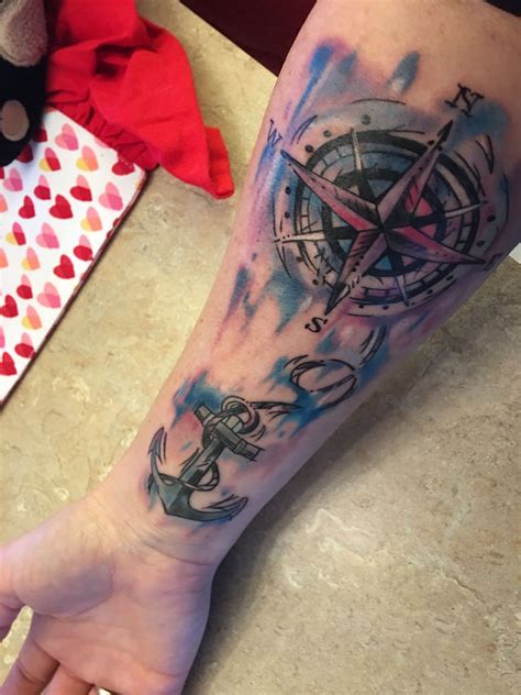 Compass With Anchor And Water Colors Compass Tattoo Design Hand Tattoos For Guys Tattoo Designs