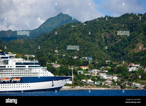 Cruise Ship Along Shore Off Roseau Main City On Dominica In The