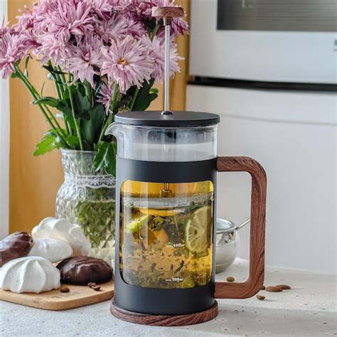 Premium Photo Black French Press With Flowers