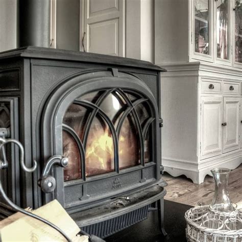 A Wood Burning Stove In A Living Room