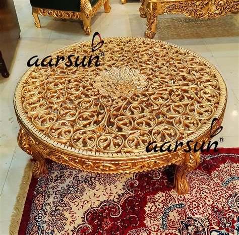 Circular coffee table in teak wood