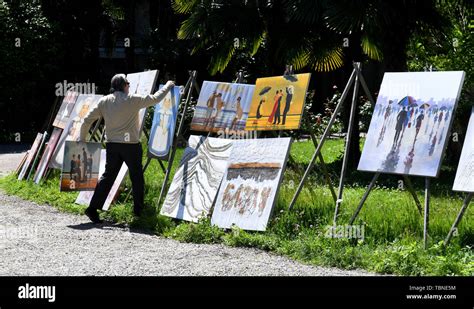 Artist Man Selling Copies Of Well Known Art Works Paintings In Stresa