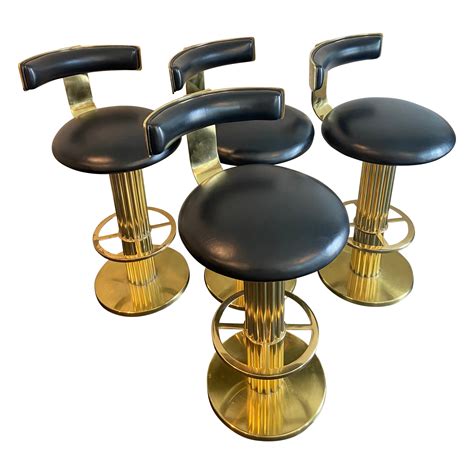 Set Of Four Excalibur Bar Stools In Channeled Brass By Design For