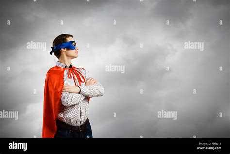 Young man wearing superman mask and cape Stock Photo - Alamy