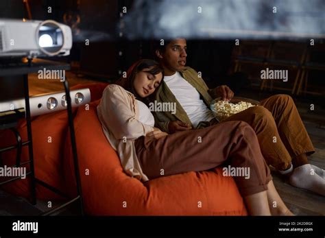 Family watching movie enjoy relax home time Stock Photo - Alamy