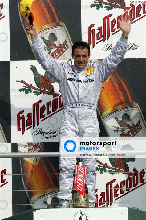 Race Winner Jean Alesi Fra Amg Mercedes Benz On The Podium Dtm