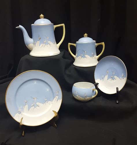 Tea Set with Crane Design | EstateSales.org