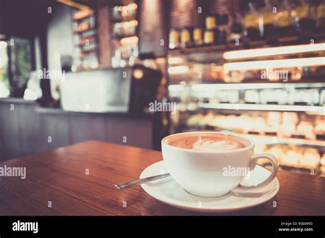 Coffee Cup In Coffee Shop Vintage Style Effect Picture Stock Photo